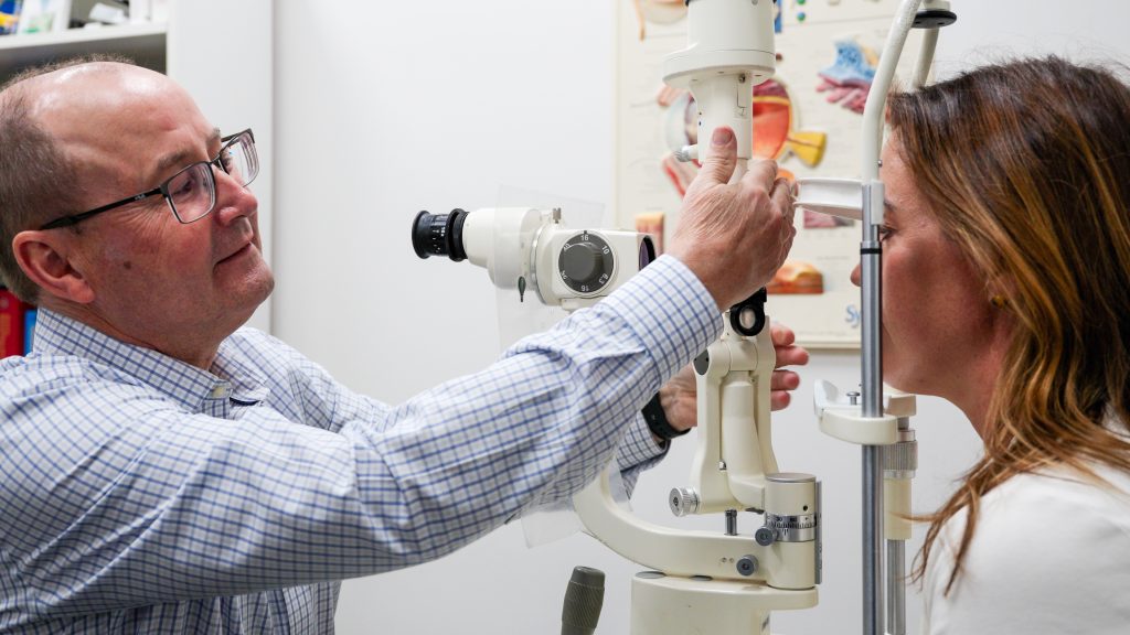 Optometrist conducting an eye examination