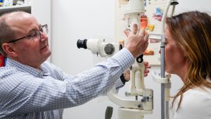 Optometrist conducting an eye examination